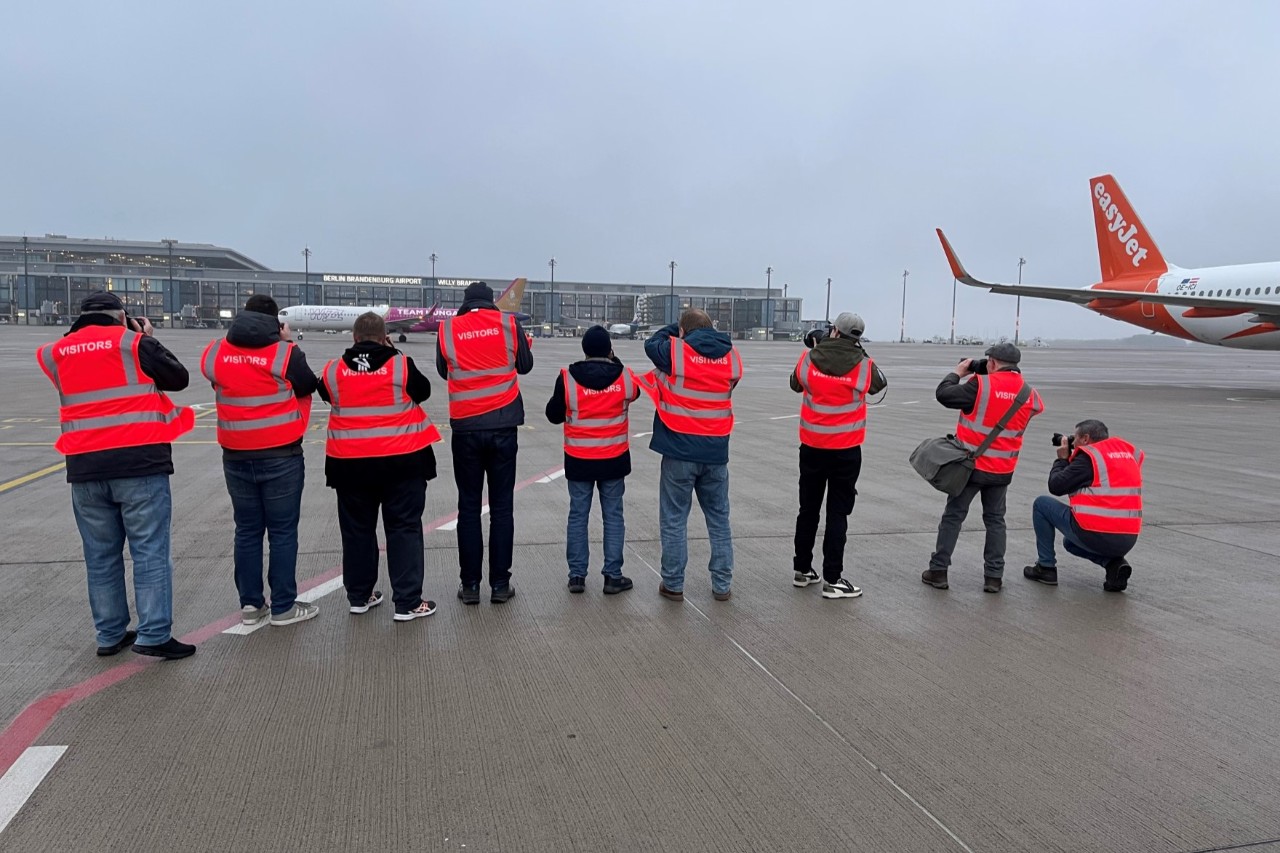 Spotter beim Fotografieren