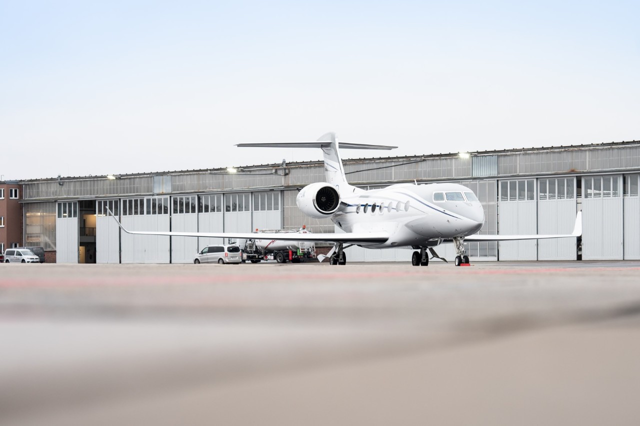 Business jet at BER in front of the hangar