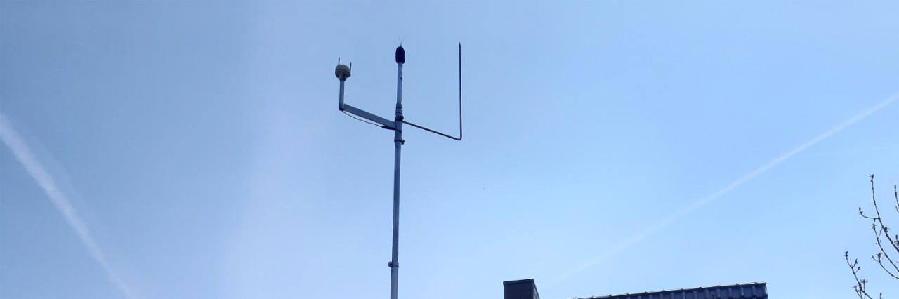 A mast against the backdrop of a blue sky