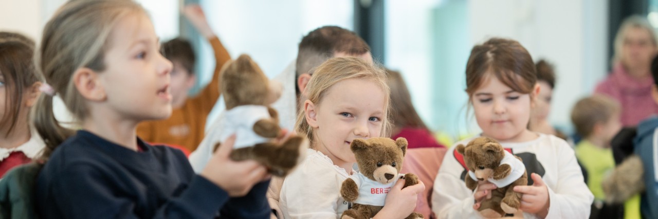 Children with teddy bears