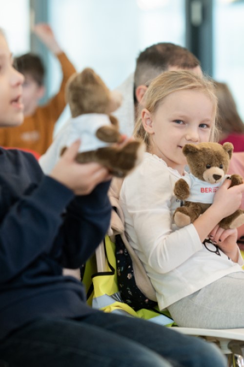 Children with teddy bears