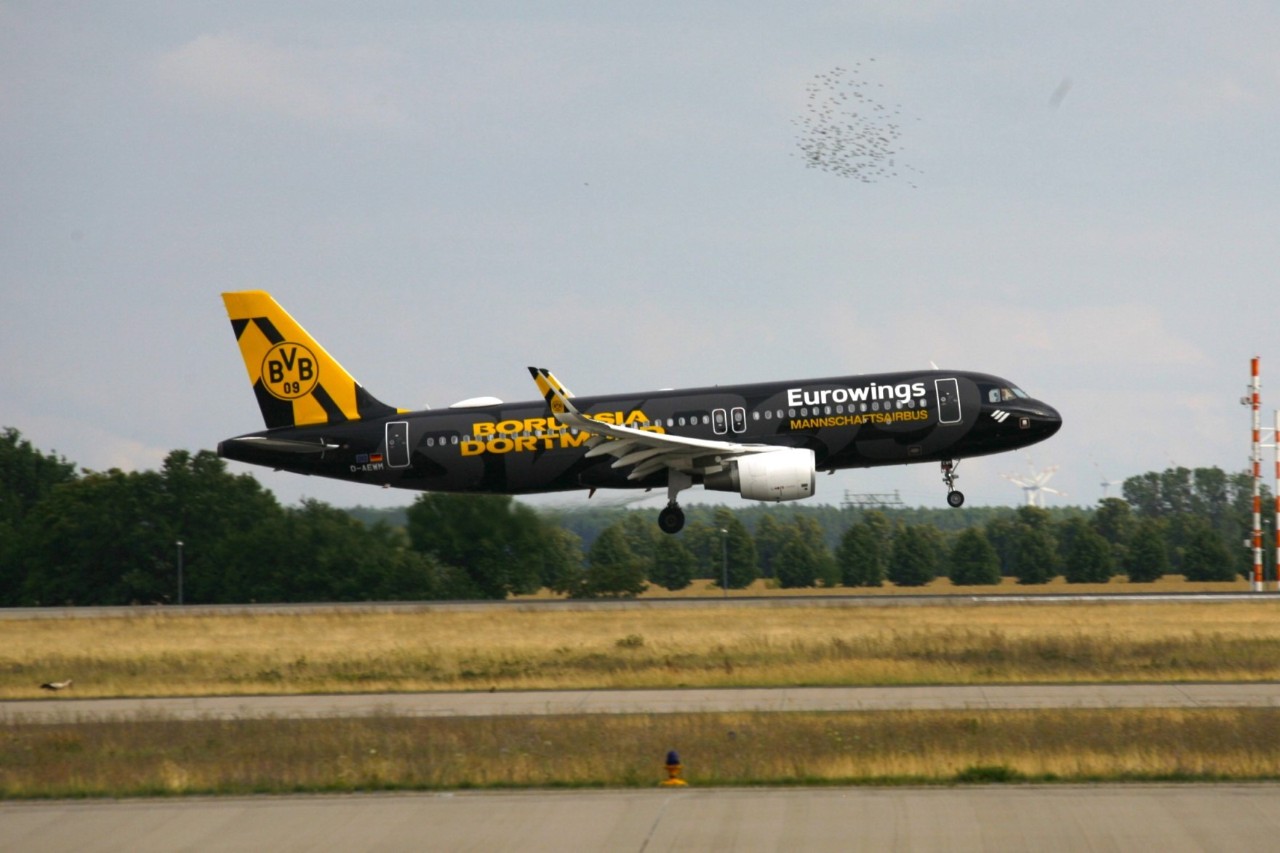 Eurowings aircraft with BVB livery at BER