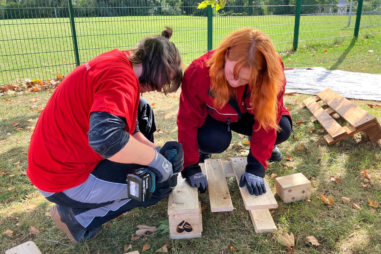 People work with wood