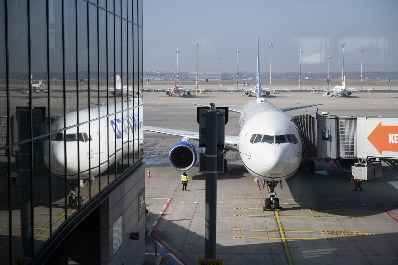 An aircraft at a gate.