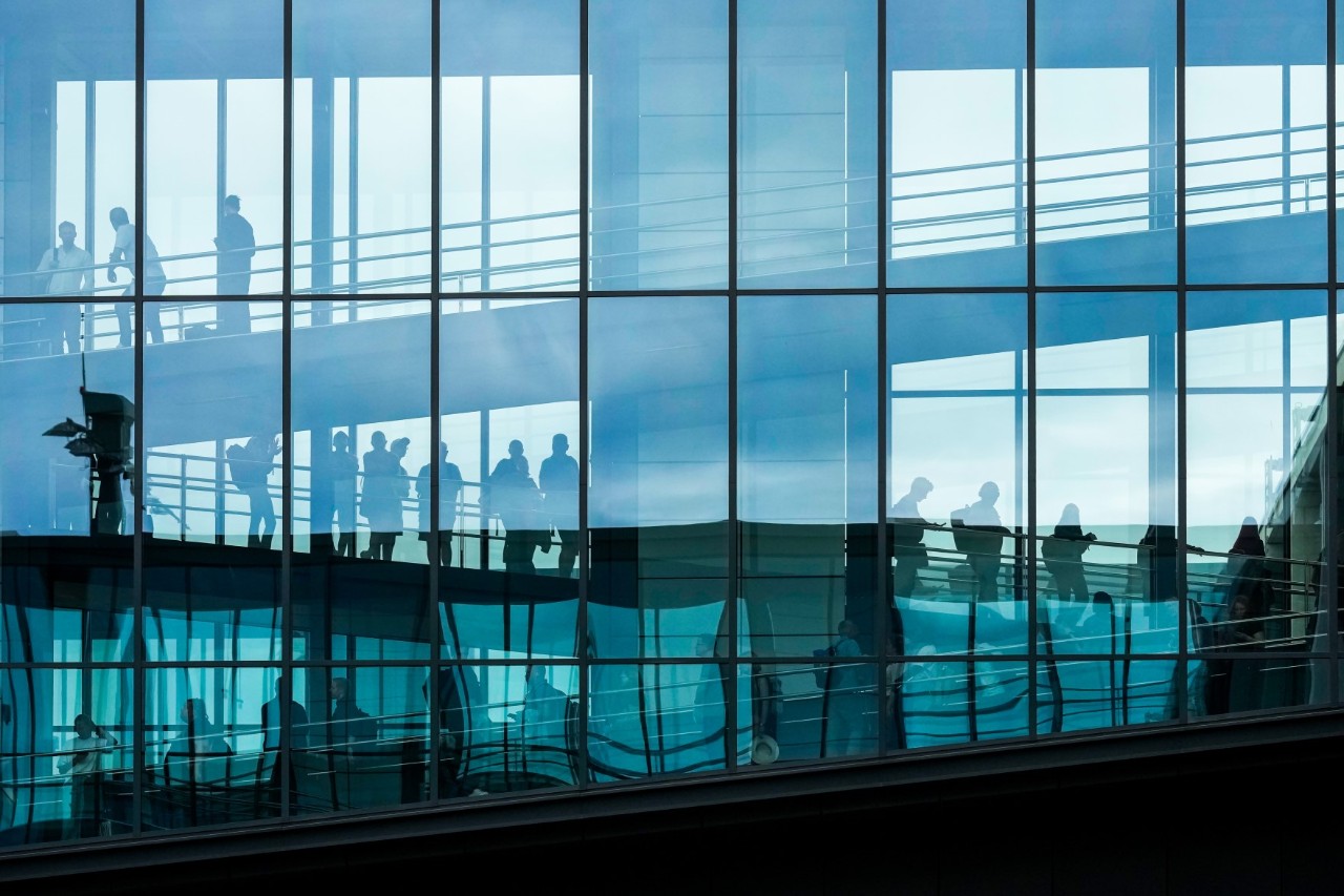 People walking in an airbridge.